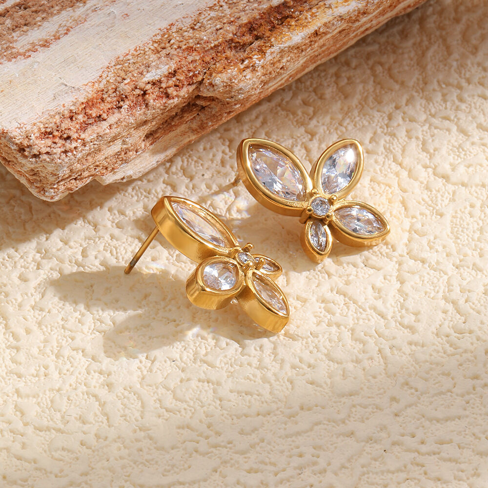 Blumenförmige, wasserdichte Ohrstecker aus Edelstahl in Goldfarbe mit Zirkonia für Damen Bild5