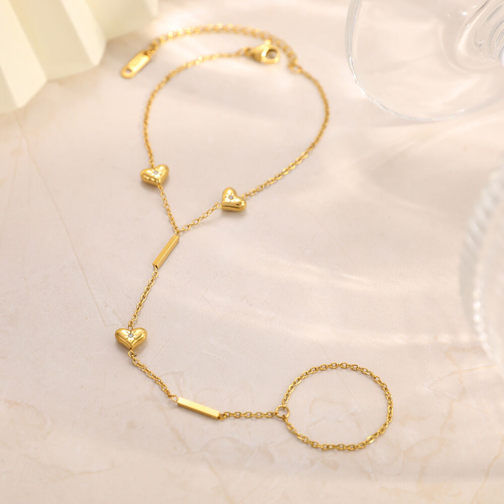Collana da polso da donna con semplice cuore in acciaio inossidabile, impermeabile, color oro e strass.