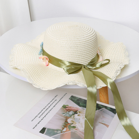 Cappello da donna in rafia con fiocco floreale e nodo a fiore, serie Simple, ideale per le vacanze.