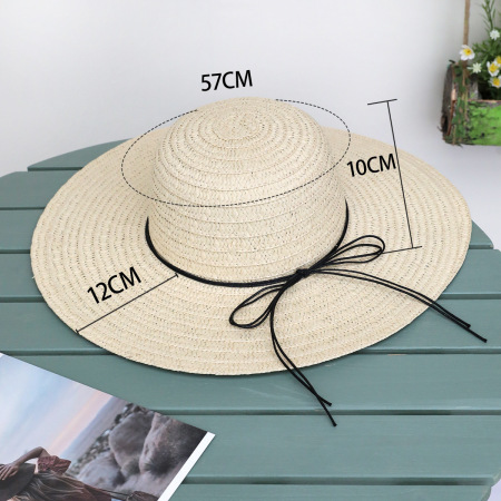 Cappello da donna in rafia tinta unita con fiocco, modello Simple Series Vacation.