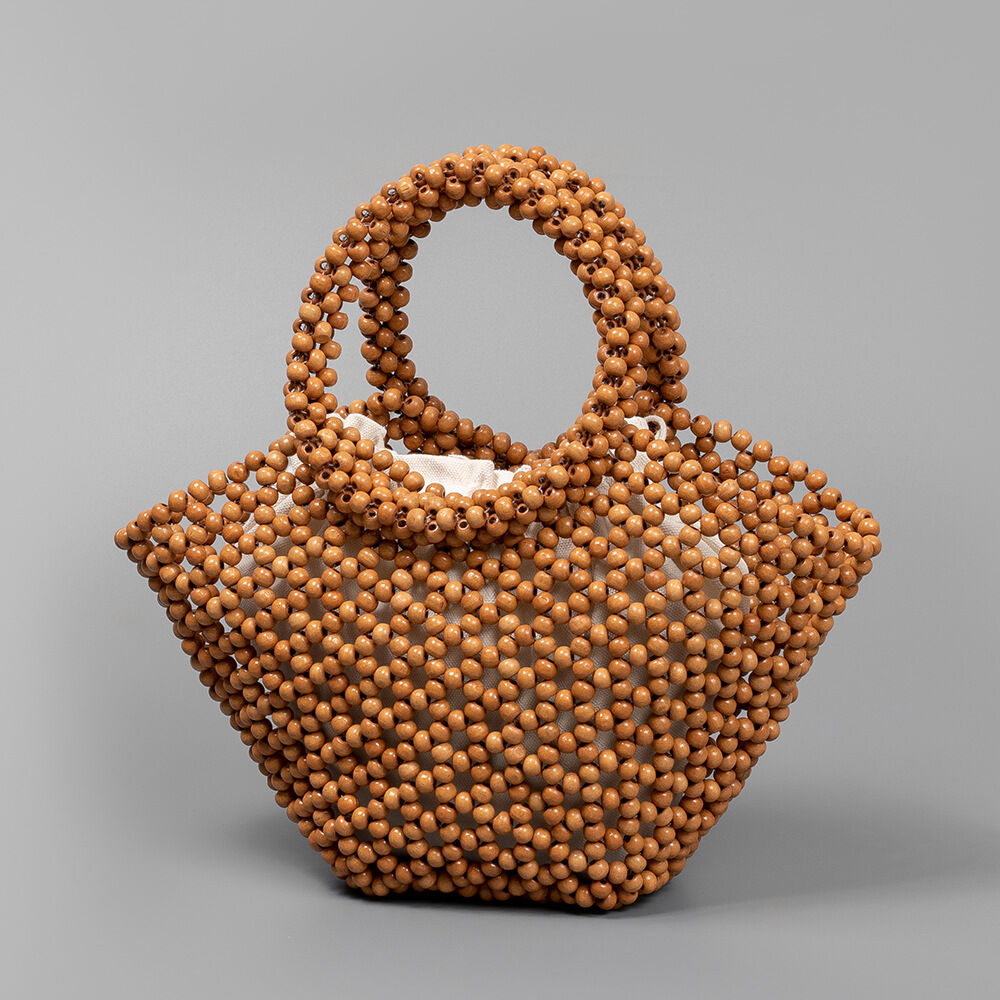Vacation Style Woven Solid Color Beads Hollowed-Out Wood Women's Trapezoid Bag