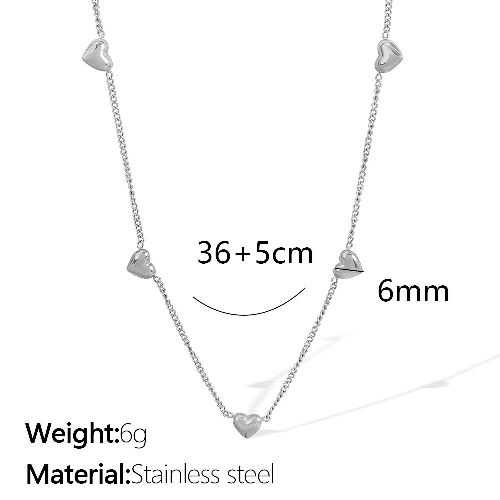 Collar de plata con cruz y corazón XL135 Imagen2