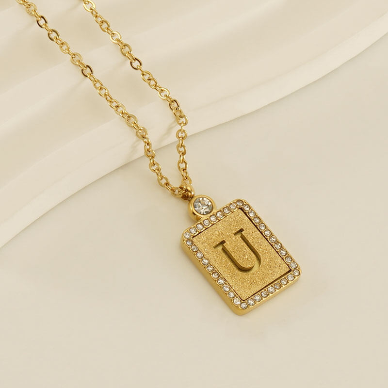 Gouden letter U [met ketting] Afbeelding21