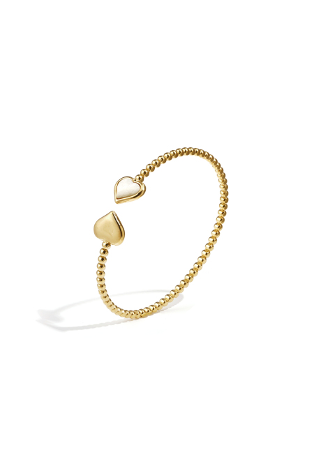 Symmetrisch gepunktetes Armband mit detaillierten Enden