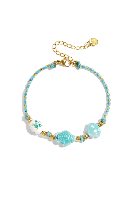 Armband mit Schildpatt- und Muschelperlen und Seilmotiv