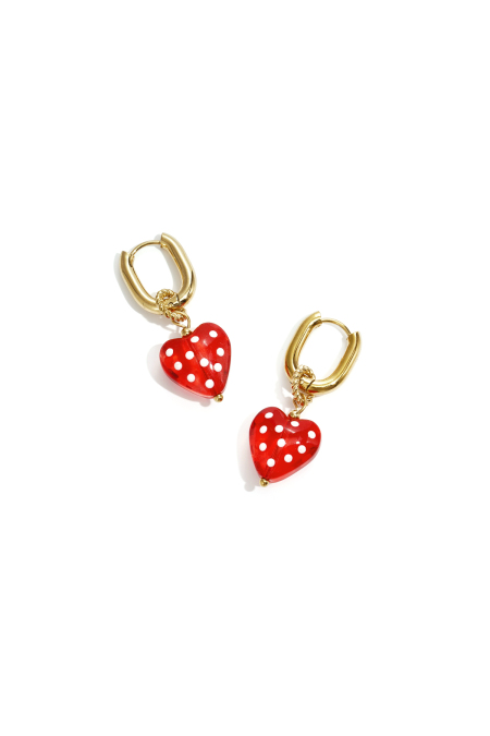 Earrings with dangling hearts with dots