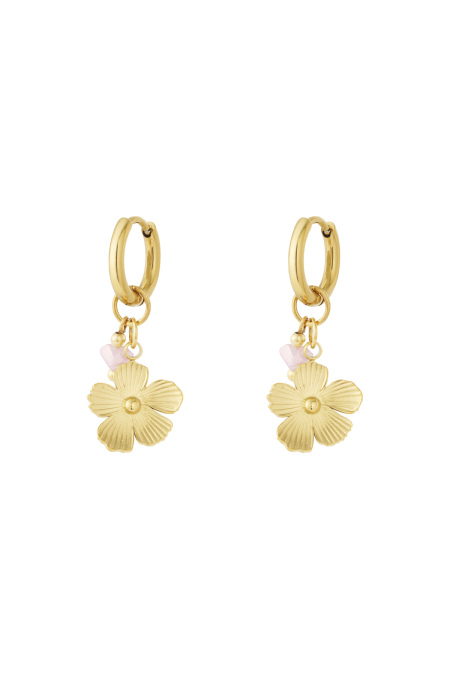Pendientes de flores iluminadas por el sol