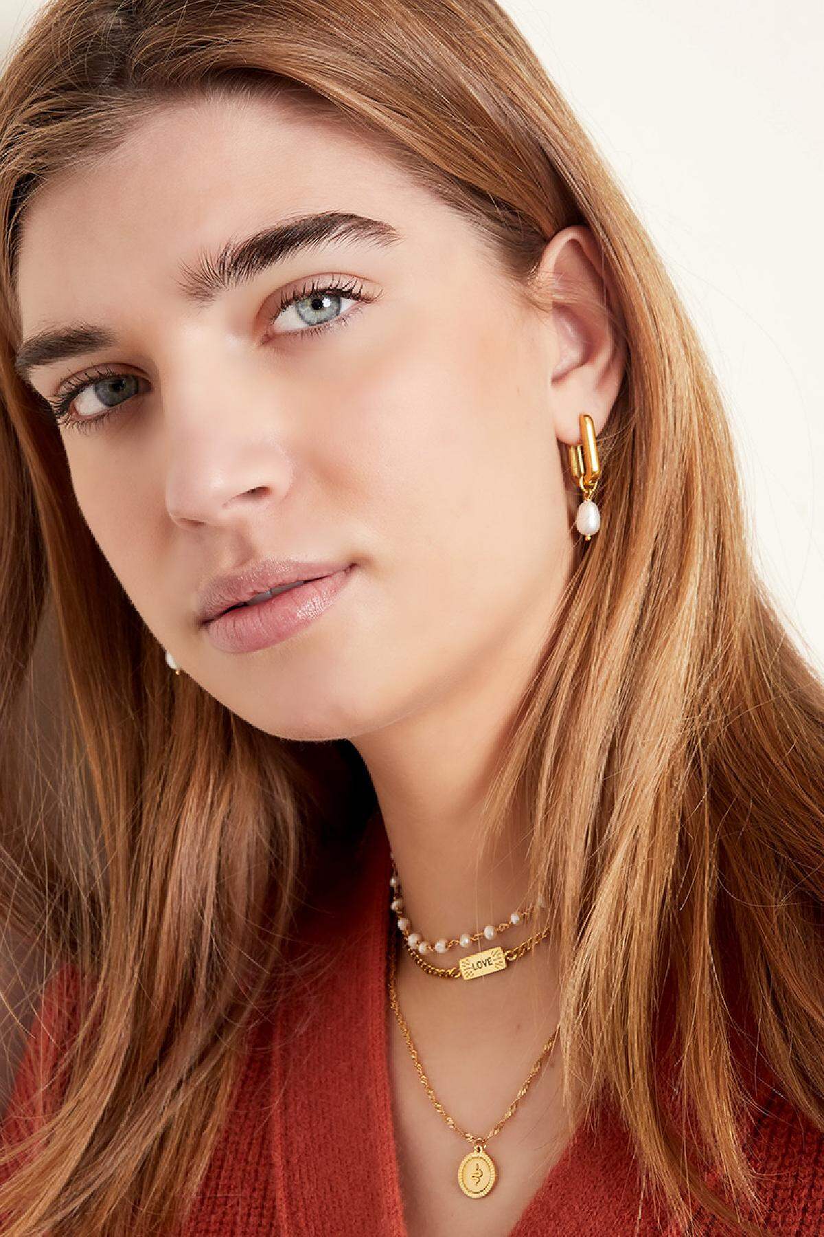 Collana con perline a forma di proiettile 