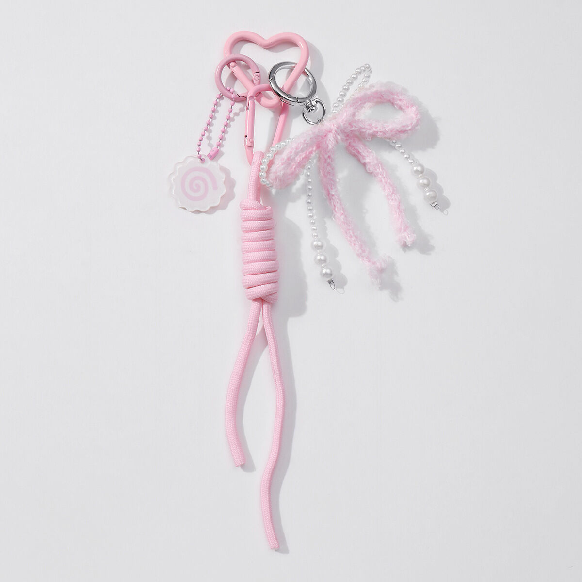 Roze wollen imitatieparel vlinderviskoek klimtouw sleutelhanger 1 Afbeelding2