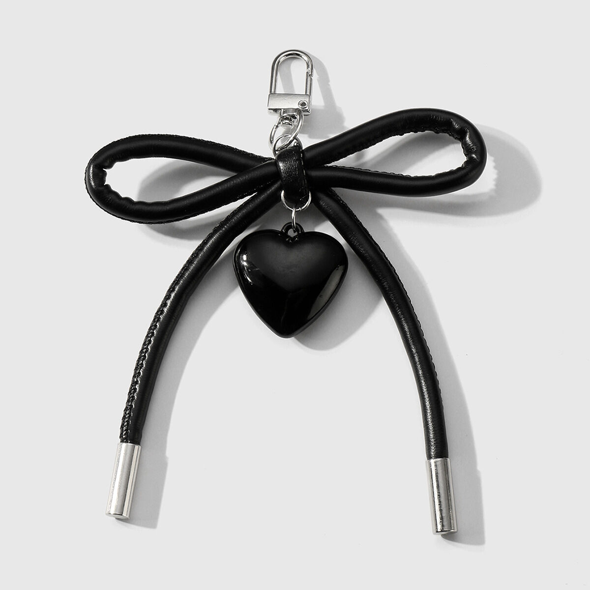 1 portachiavi a forma di cuore con fiocco nero Immagine2