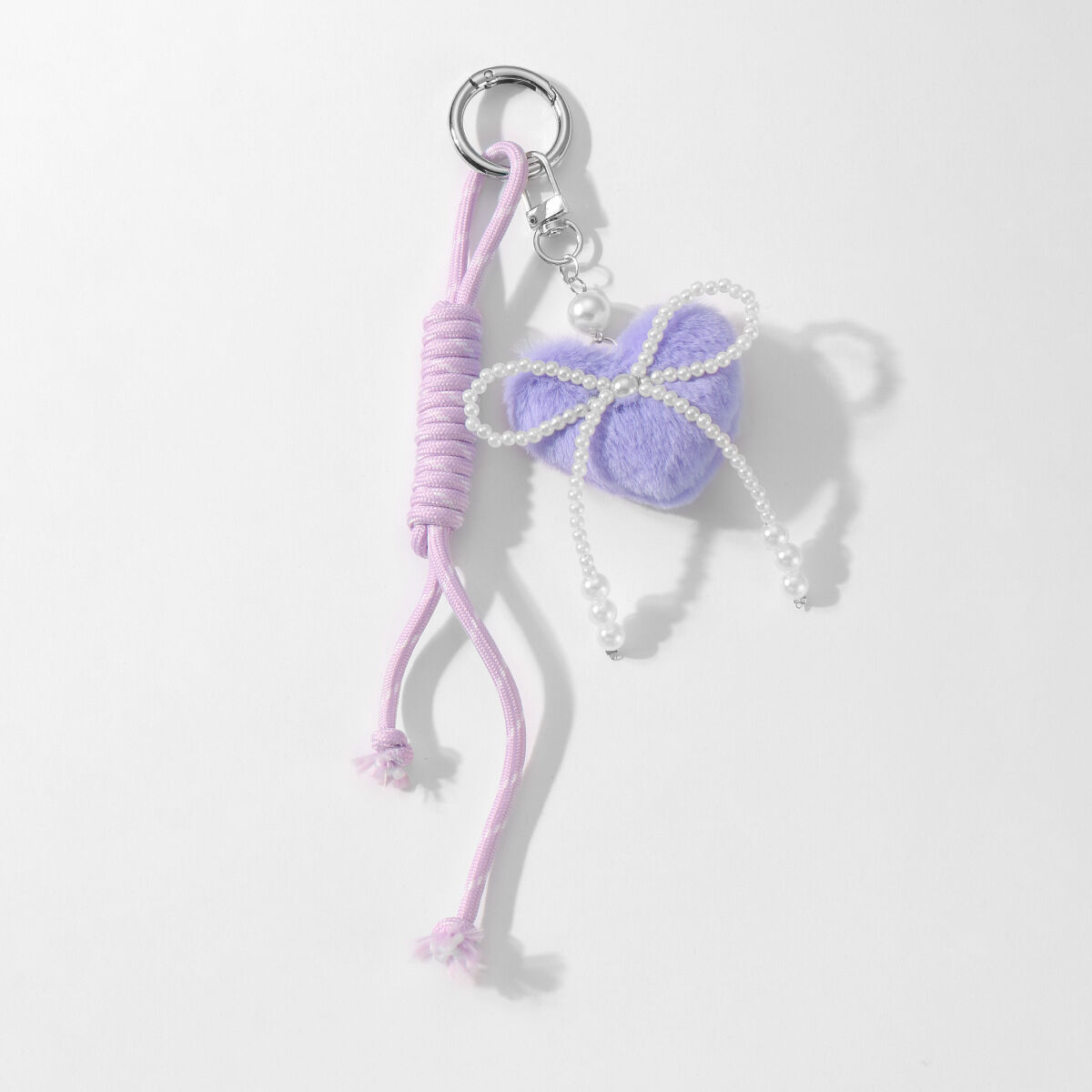 1 portachiavi con fiocco a forma di cuore viola Immagine2