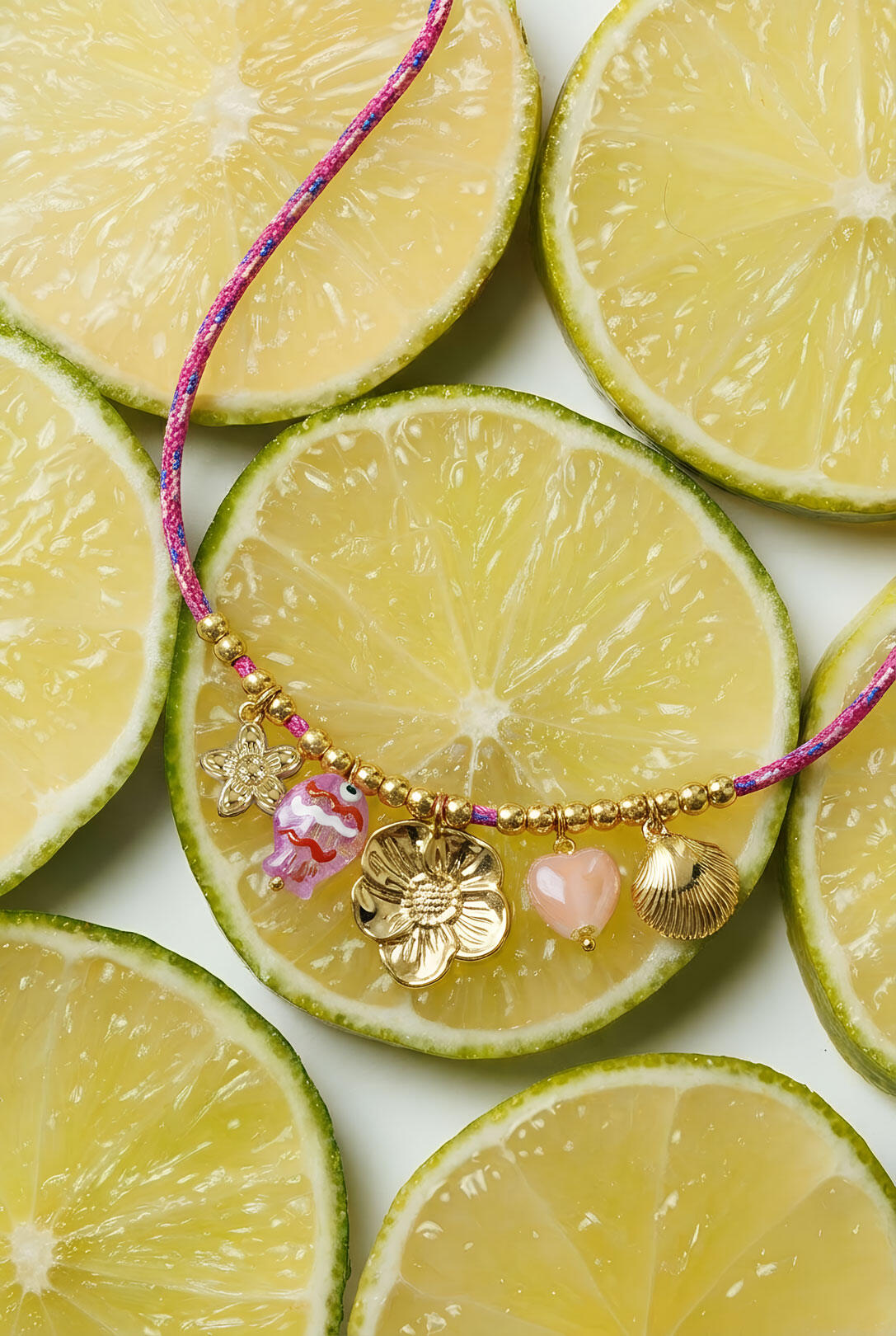 Colorful cord necklace with varying pendants and fish pendant Picture2