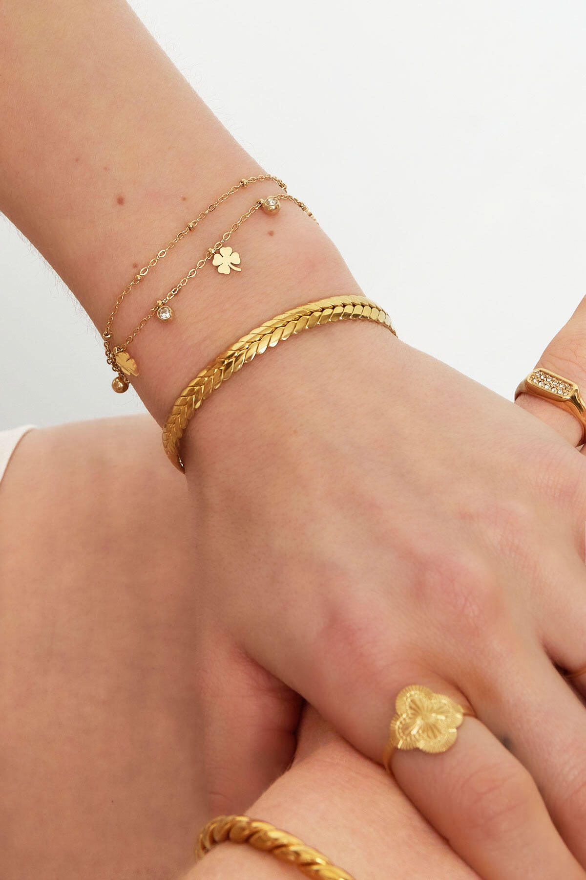 charm bracelet with clover and diamond