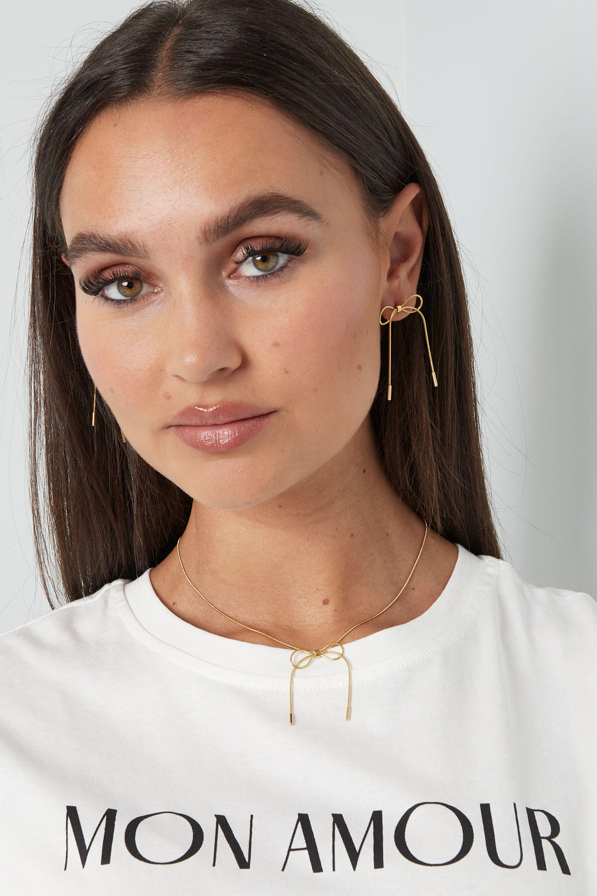 link earrings with bow