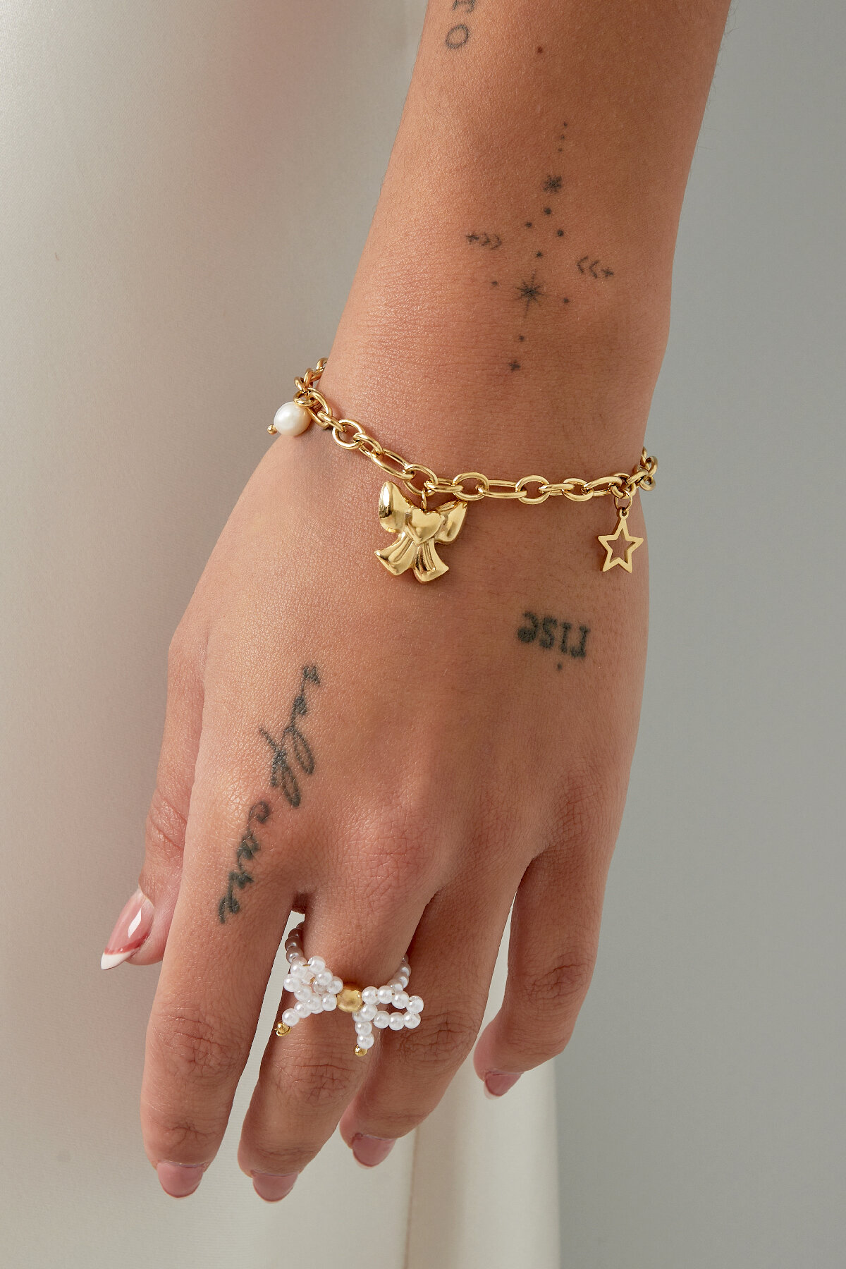 Bettelarmband mit Schleife 