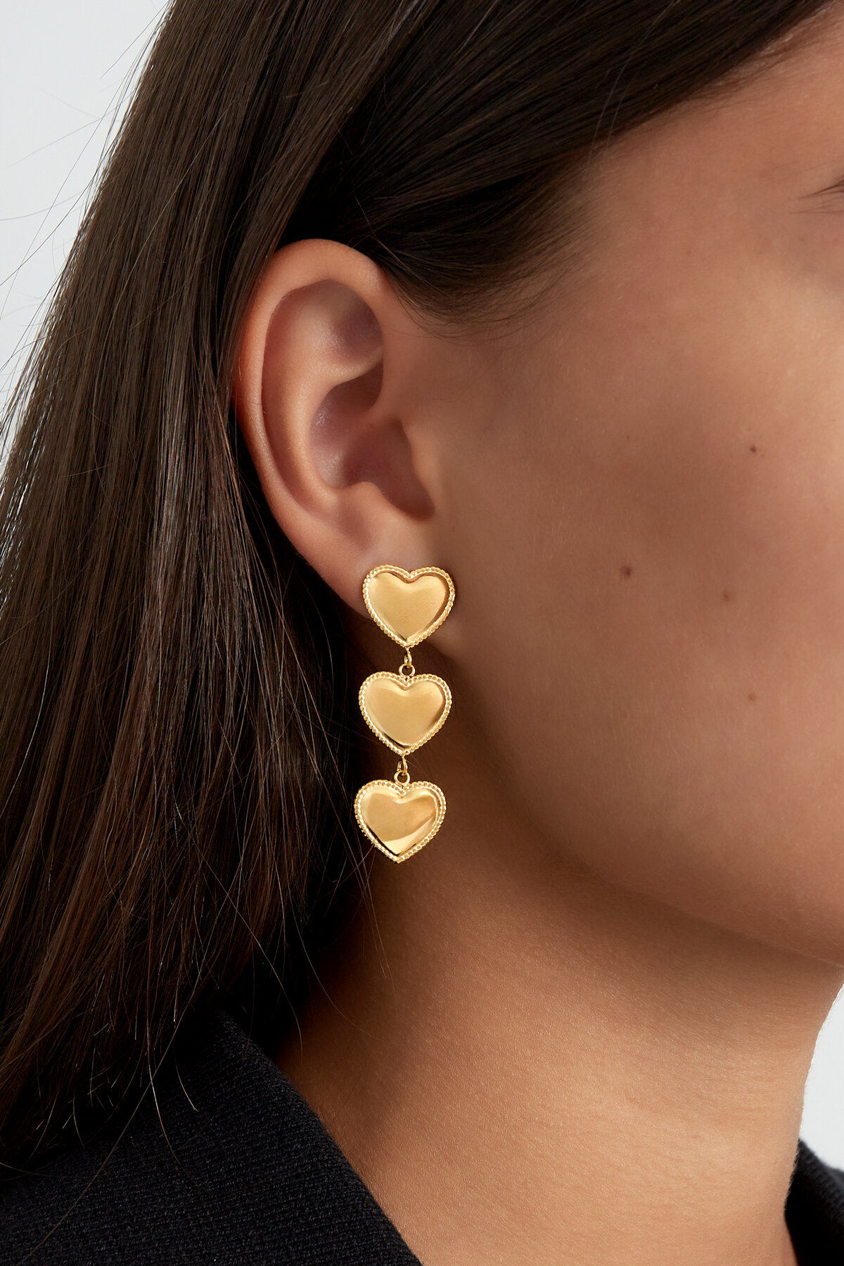 pendientes de corazones apilados