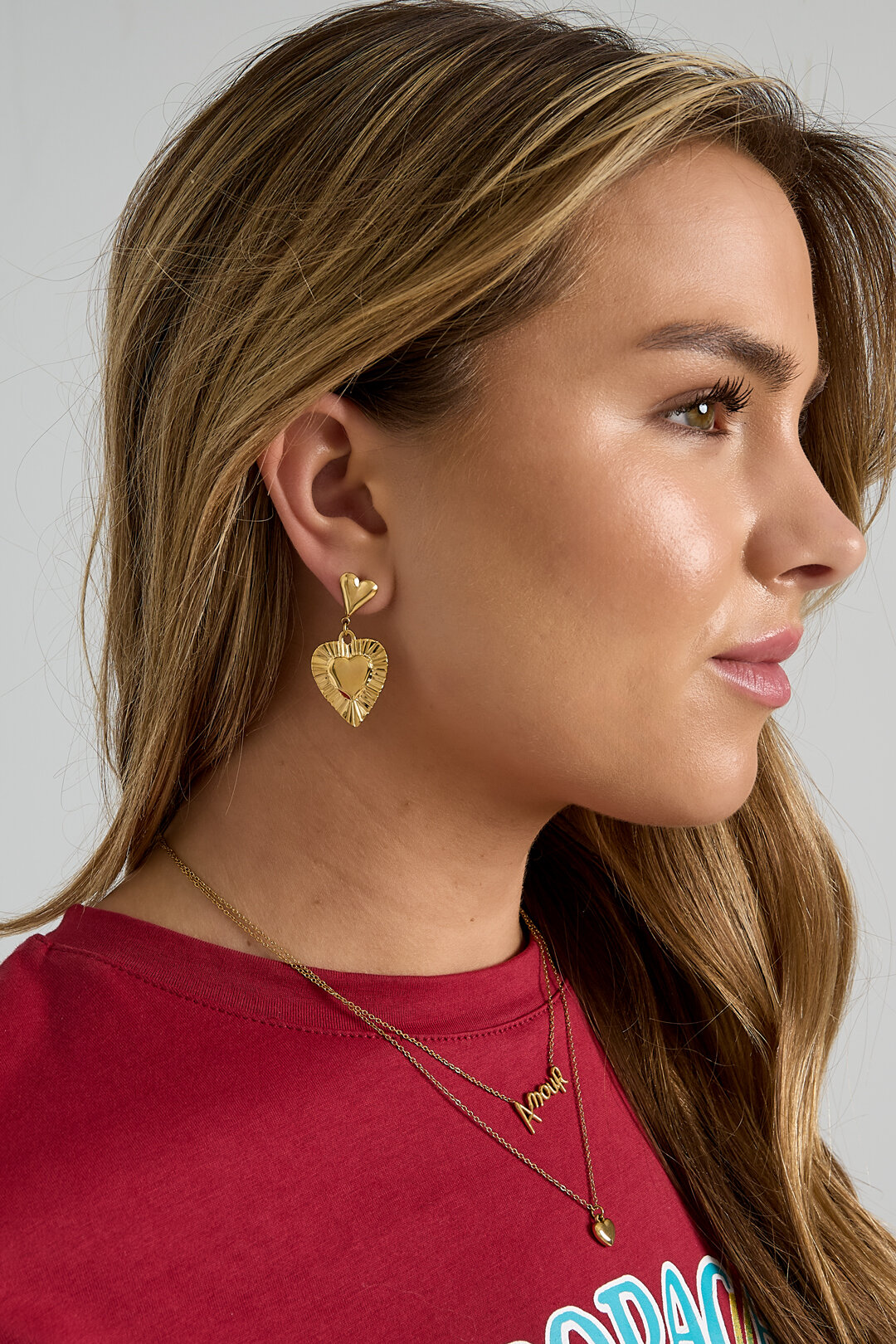 Boucles d'oreilles avec pendentifs en forme de cœur
