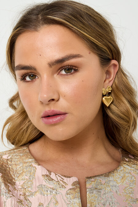 Boucles d'oreilles nœud avec cœur pendant