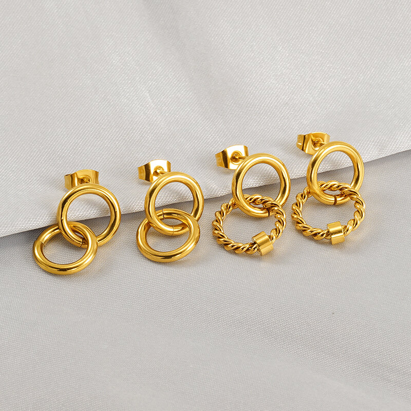 1 par de aretes de botón de acero inoxidable chapados en oro de 18 quilates con diseño de giro diario para mujer h5Imagen3