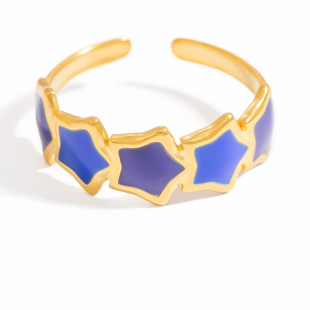 Bague ajustable pour femme, collection Charming Series, en acier inoxydable doré, finition huilée, forme étoile chromatique. Image12