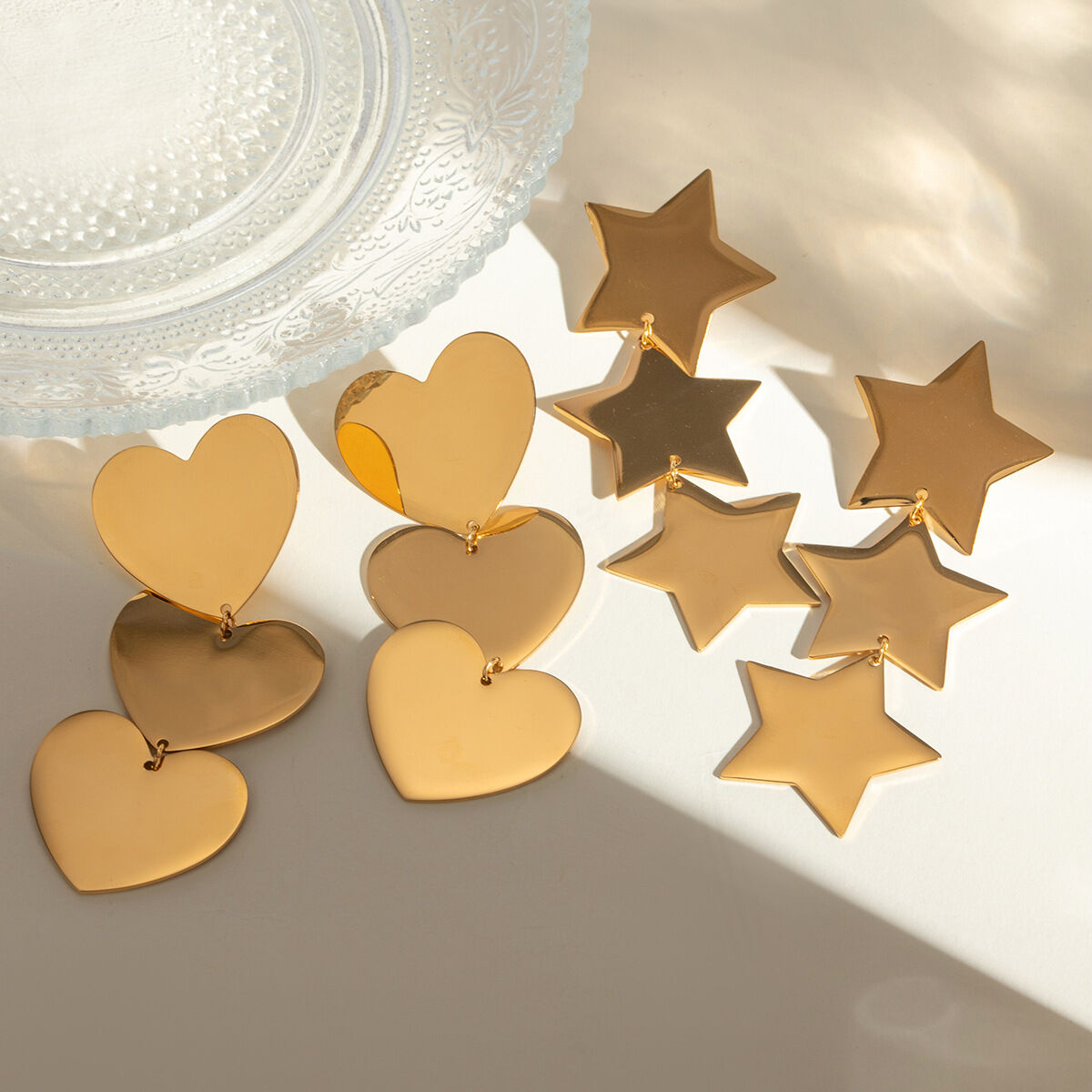 pendientes de corazón lisos de tres capas de acero inoxidable en oro de 18 quilates con diseño de nicho estilo  transfronterizo europeo y americano para mujer