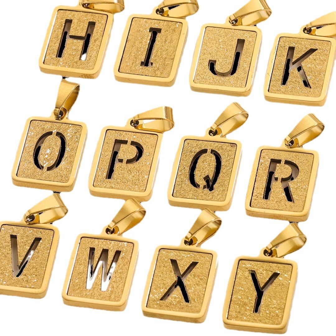 1 paio di ciondoli unisex in acciaio al titanio placcati in oro , serie semplice, lettera semplice Immagine5