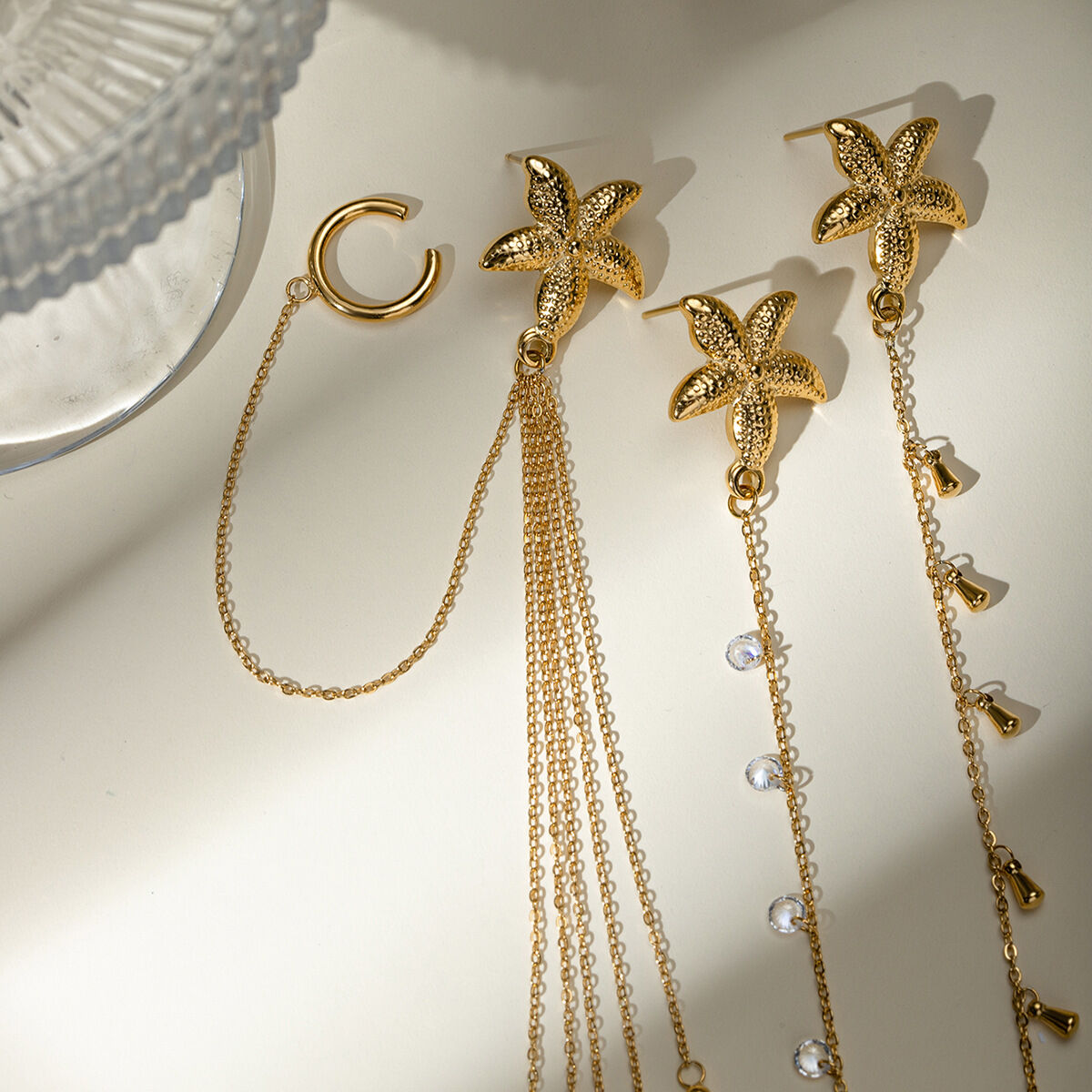 europäischer und amerikanischer grenzüberschreitender -stil, high-end-persönlichkeitstrend, 18 karat gold, edelstahl, einzelne seestern-strass-ohrclip-ohrringe h5 Bild3