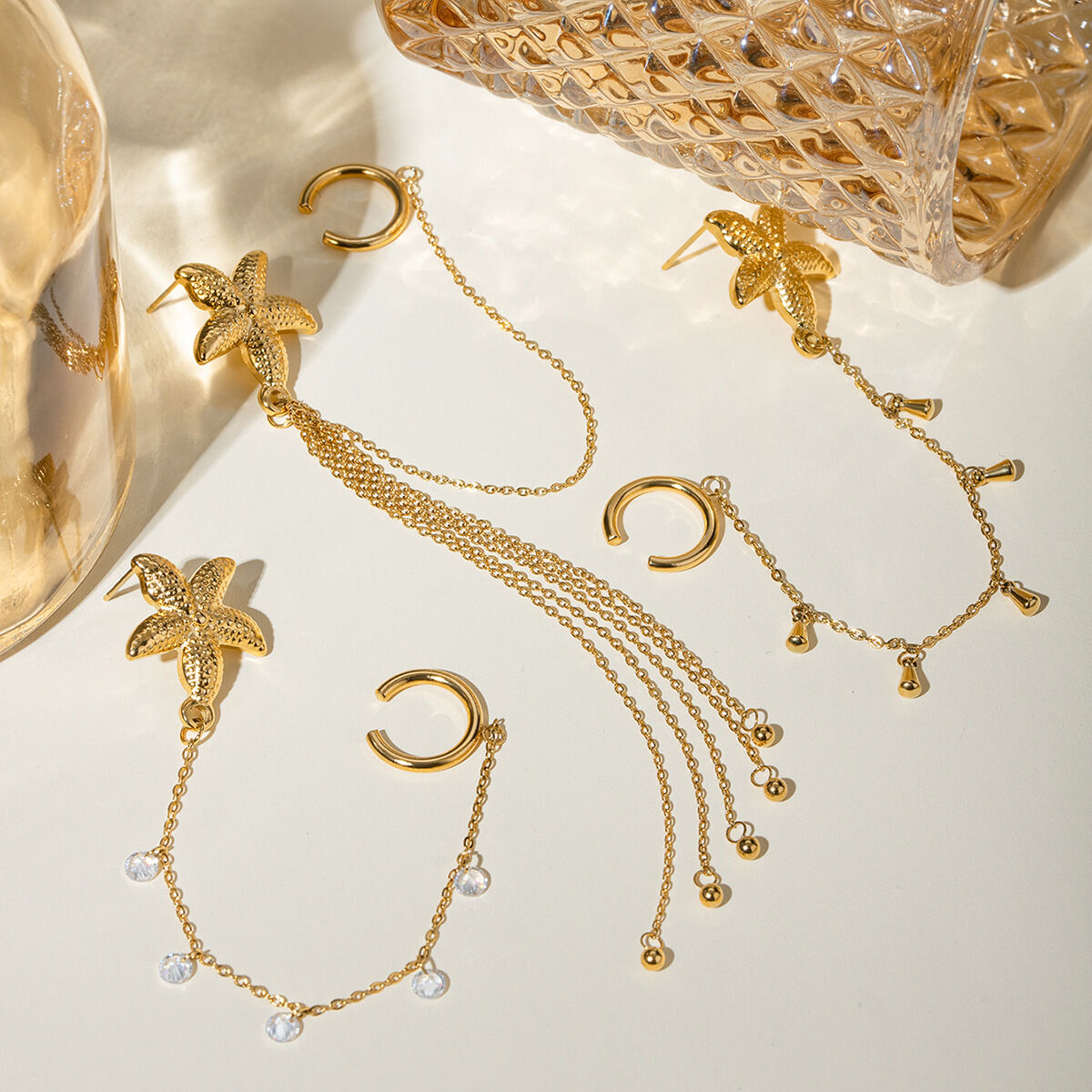 europäischer und amerikanischer grenzüberschreitender -stil, high-end-persönlichkeitstrend, 18 karat gold, edelstahl, einzelne seestern-strass-ohrclip-ohrringe h5 Bild4