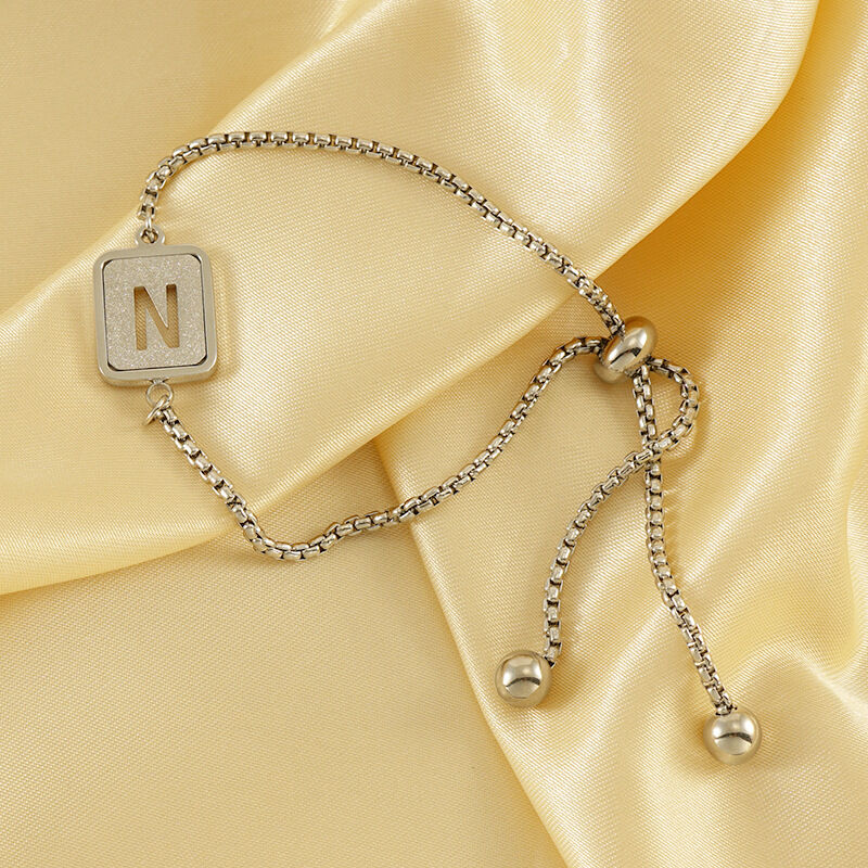 1 stuk eenvoudige serie dagelijkse brief titanium staal  vergulde dames ketting armbanden Afbeelding4