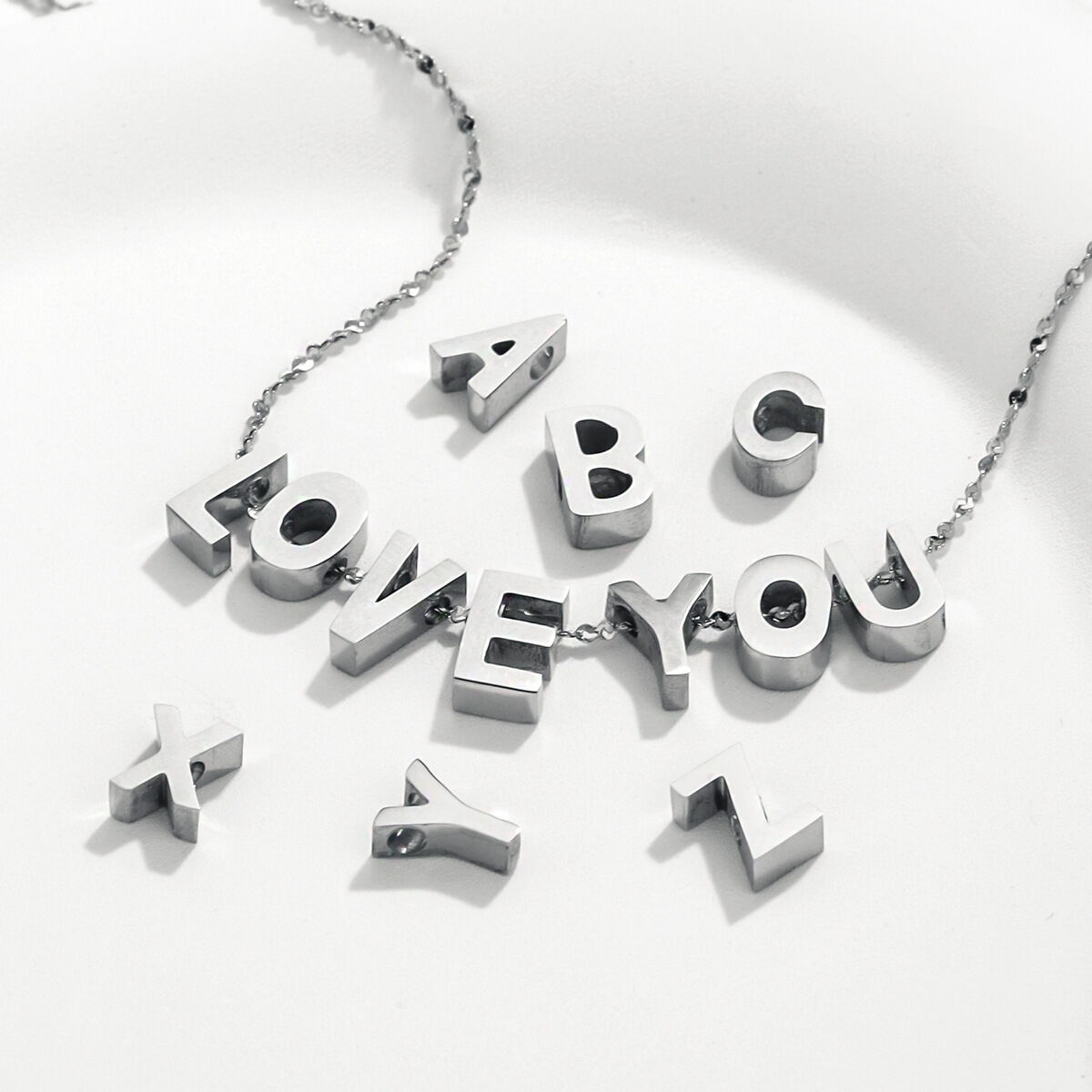 1 paio di ciondoli unisex con lettere casual della serie semplice