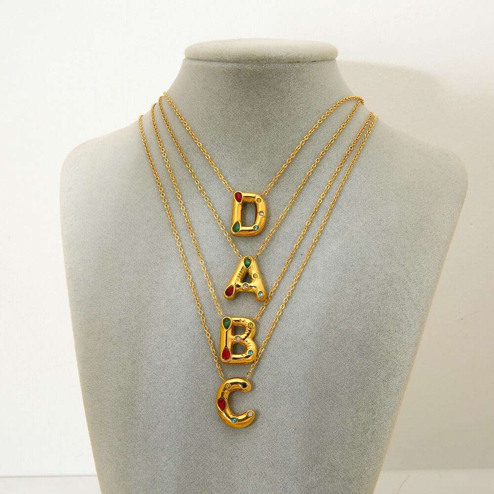 Collana da donna impermeabile in acciaio inossidabile color oro con lettera a bolla alla moda h5Immagine4