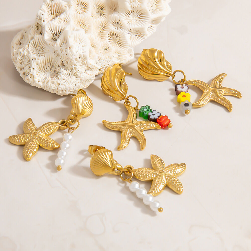 Orecchini pendenti in acciaio inossidabile a forma di stella marina color oro impermeabili 2