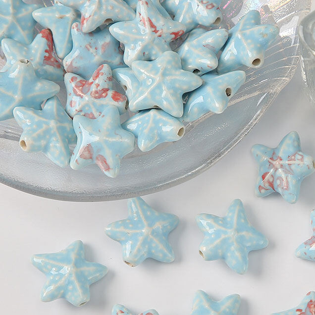 1 pezzo di perlina in ceramica a forma di stella marina per gioielli fai da te Immagine3