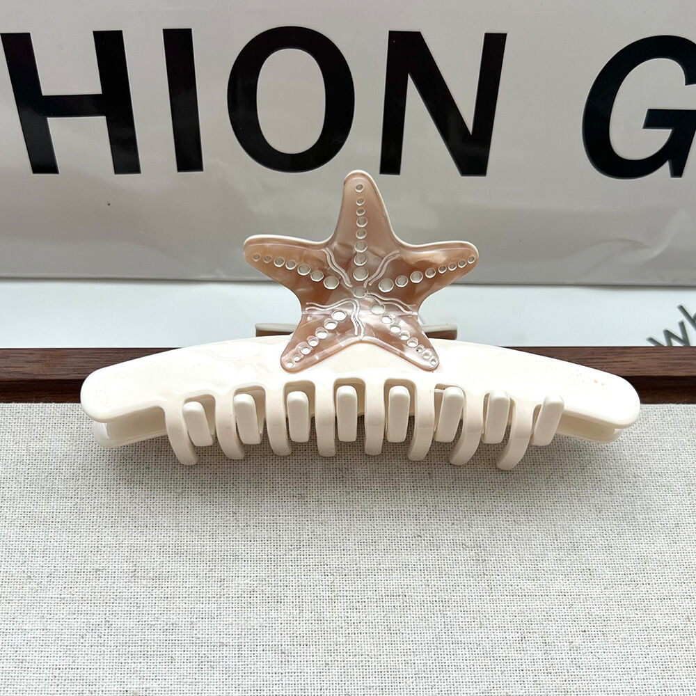 Fermaglio a forma di stella marina beige 11,5*4,5 cm Immagine2