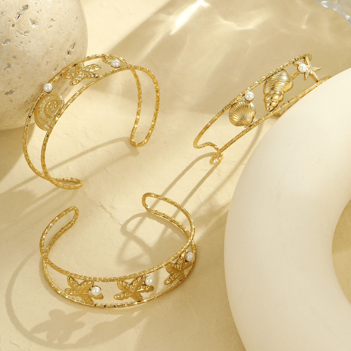 Pulseras de mujer de acero inoxidable dorado, resistentes al agua y con temática de caracola de estilo lujoso 2