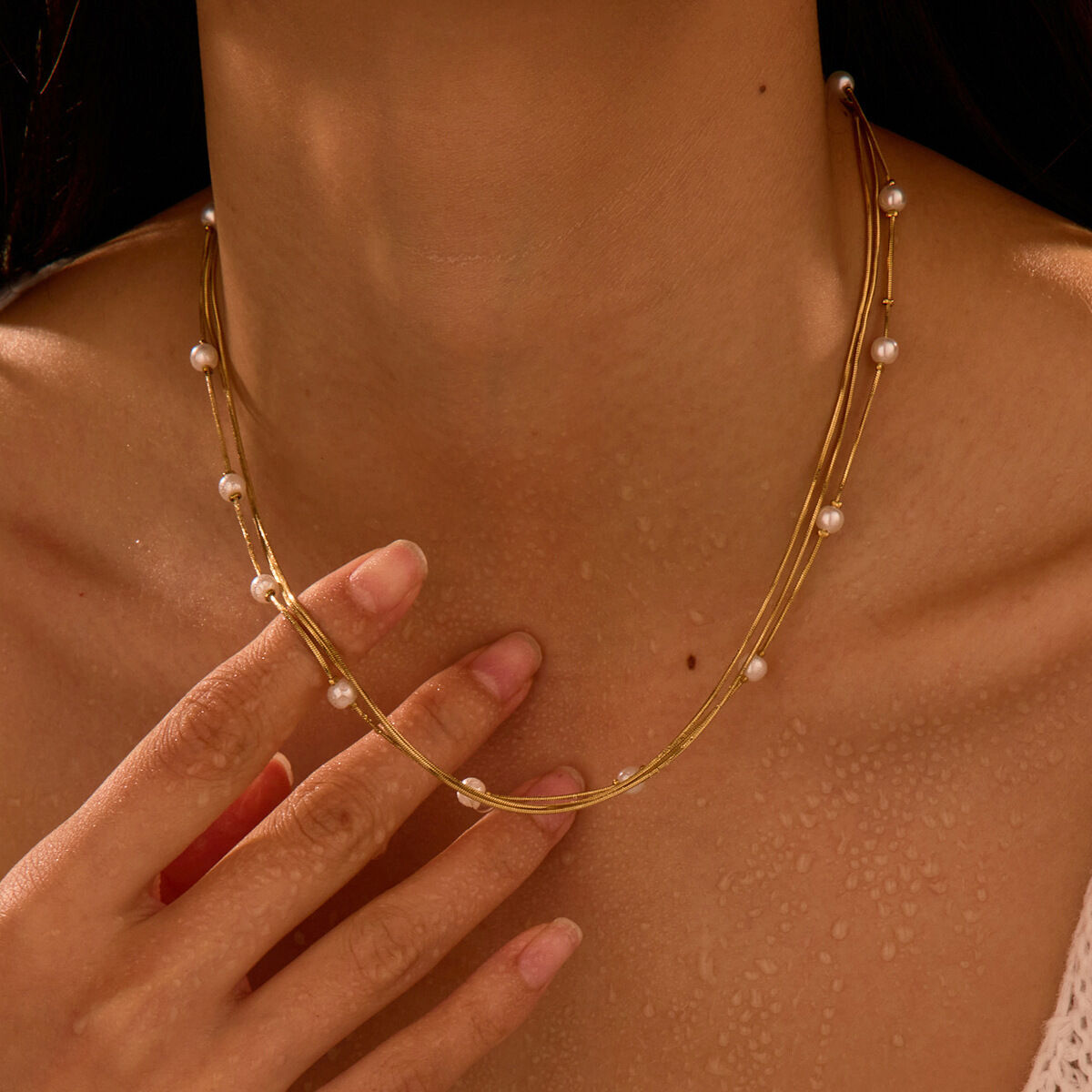 Elegante, waterdichte damesketting van roestvrij staal in goudkleur.