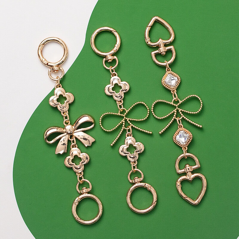 1 pezzo di squisita serie con cinturino estensibile in alluminio color oro con fiocco h5 Immagine3