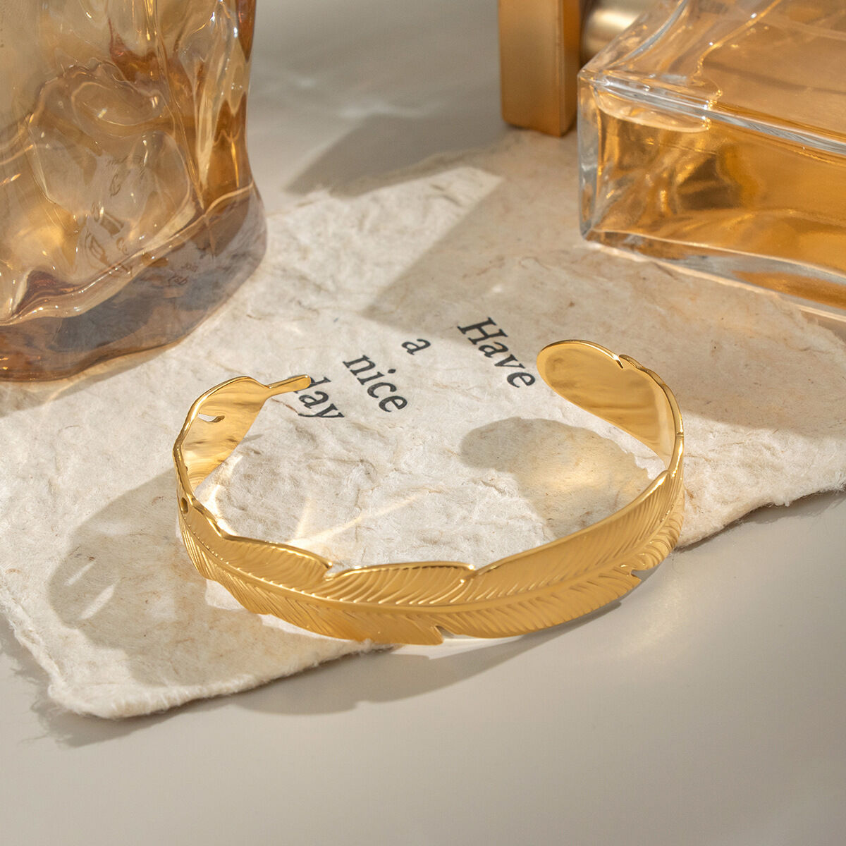 Bracciale rigido impermeabile color oro a forma di foglia in acciaio inossidabile da 1 pezzo h5 Immagine4