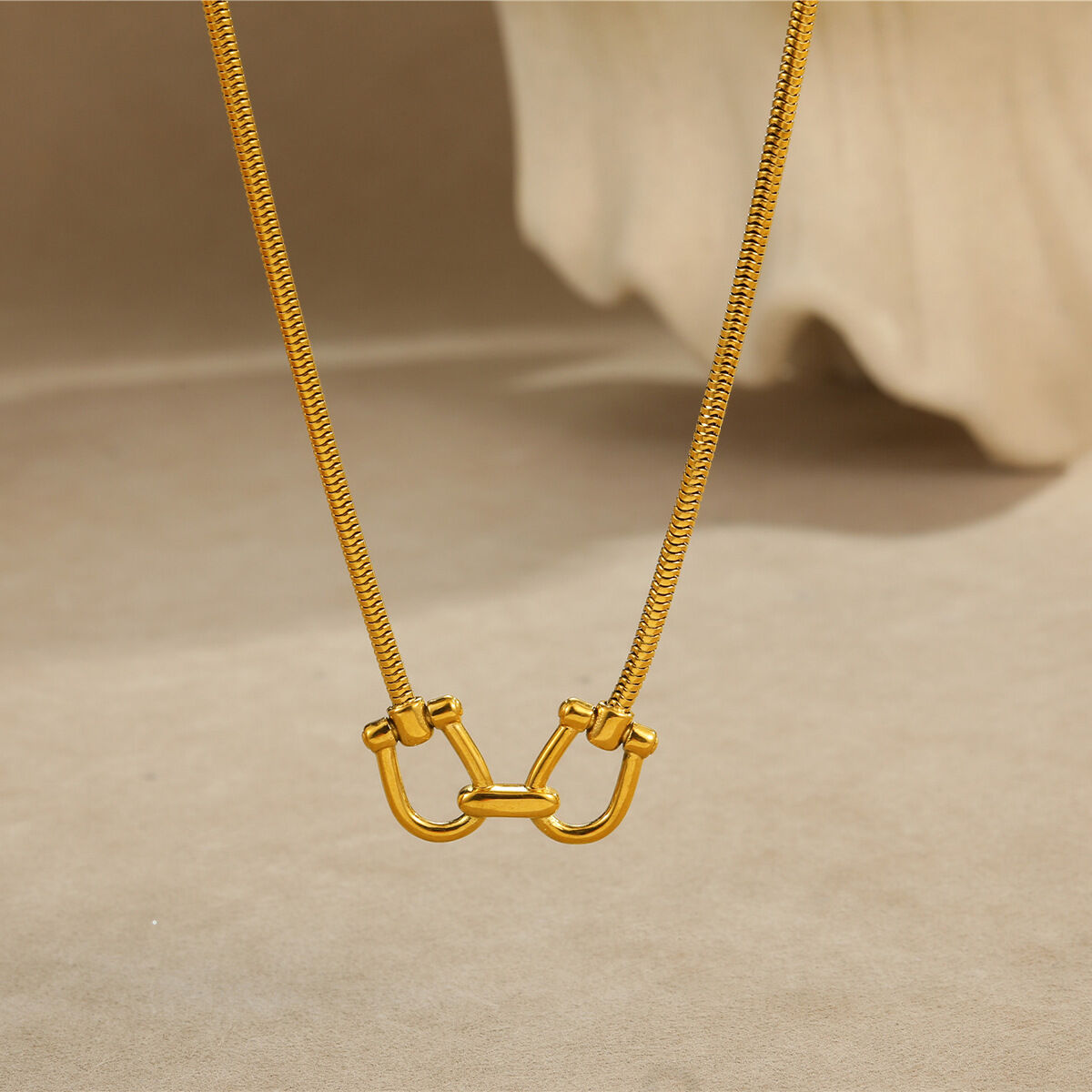Collane con ciondolo geometrico in acciaio inossidabile impermeabile color oro da donna Immagine4