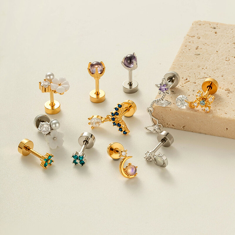 1 pezzo di orecchini con zirconi color rame e oro
