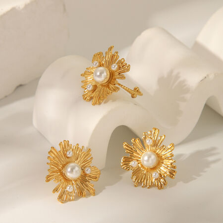 Elegante oorbellenset van roestvrij staal met bloemen en gouden kleur