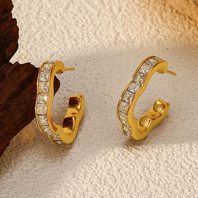1 par de pendientes colgantes de acero inoxidable de forma irregular, resistentes al agua, de color dorado. Imagen4