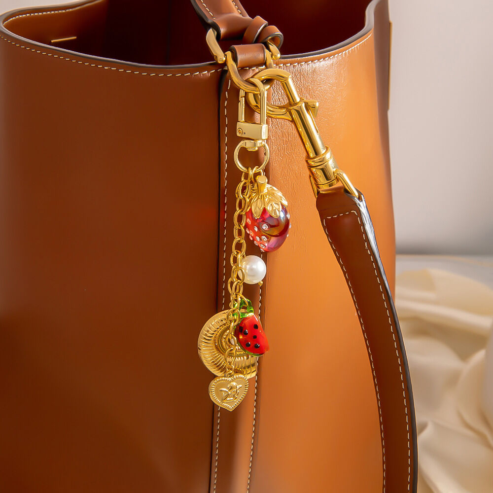 1 pezzo di ciondolo per borsa in acciaio inossidabile color oro con frutta carina h5 Immagine2