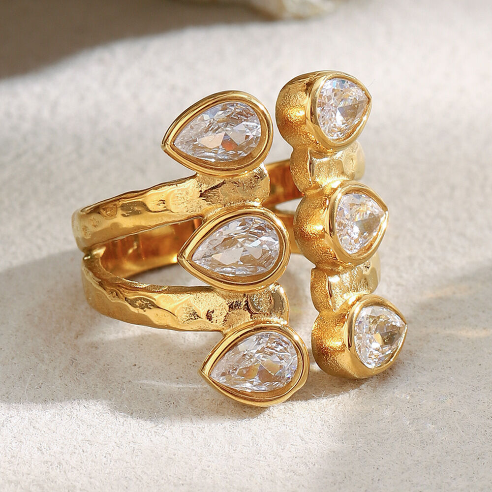 1 eleganter, doppelwandiger, wasserdichter Damenring aus Edelstahl in Goldfarbe mit Zirkonia-Besatz im Tropfendesign