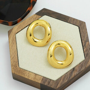 1 stuk elegante, onregelmatig gevormde, waterdichte, goudkleurige oorbellen voor dames. h5 Afbeelding5