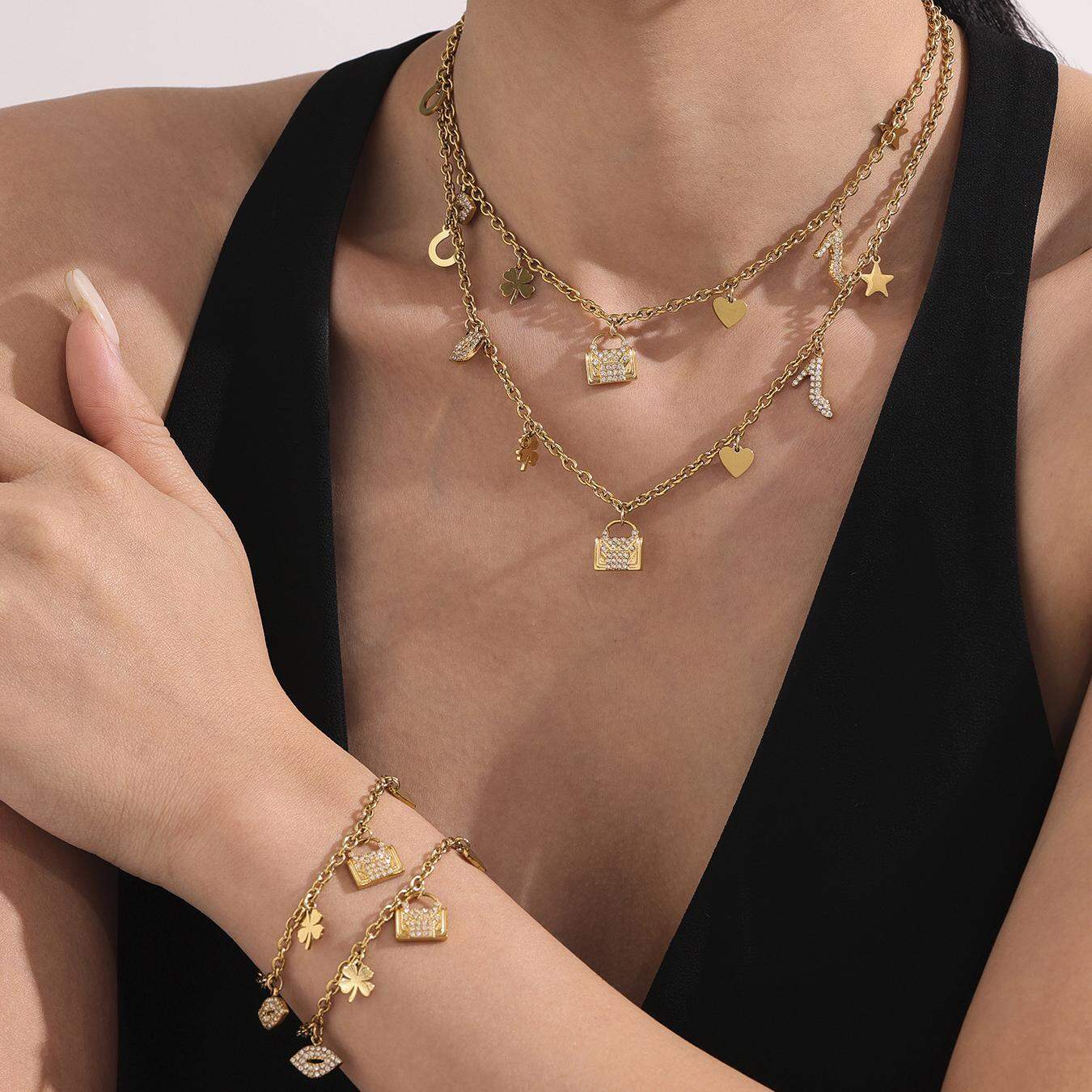 Set di gioielli da donna alla moda in acciaio inossidabile con motivo a cuore e trifoglio, color oro e impermeabili