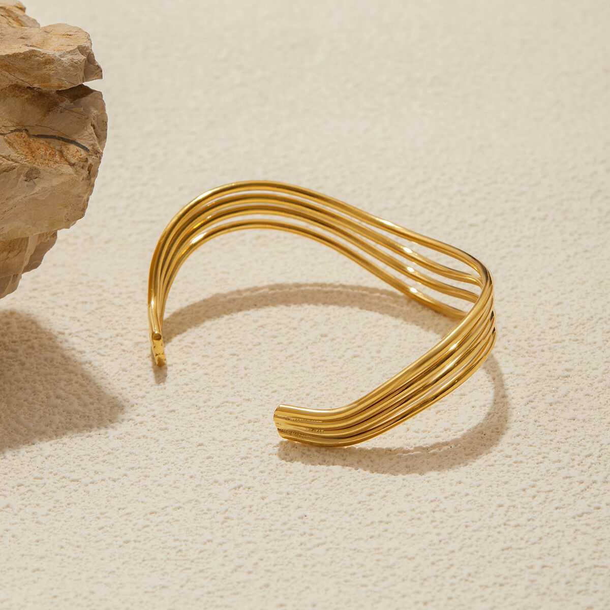 1 stuk klassieke, golvende, waterdichte, goudkleurige damesarmband van roestvrij staal h5 Afbeelding8