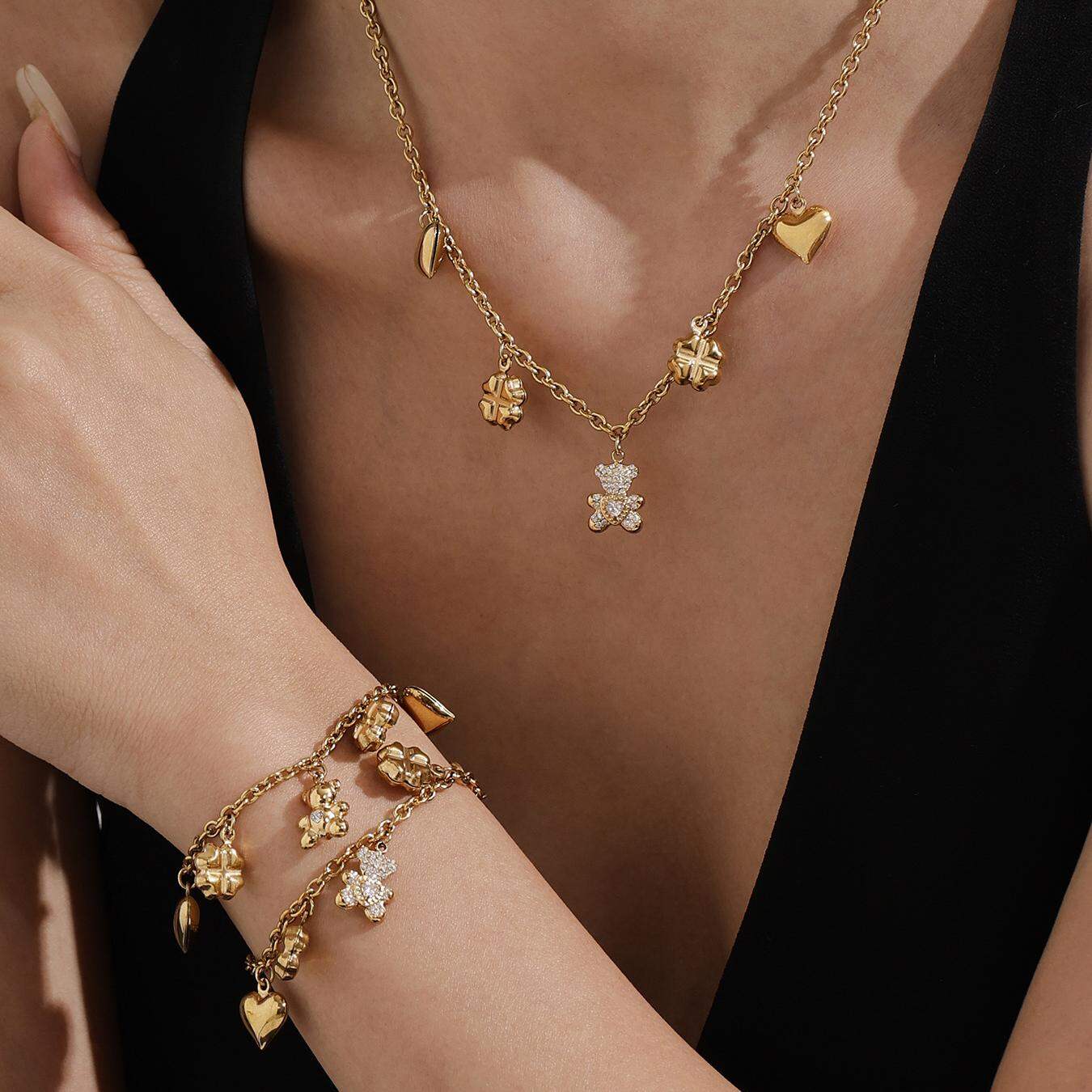 Set di gioielli da donna in acciaio inossidabile impermeabile color oro con simpatico orso e trifoglio