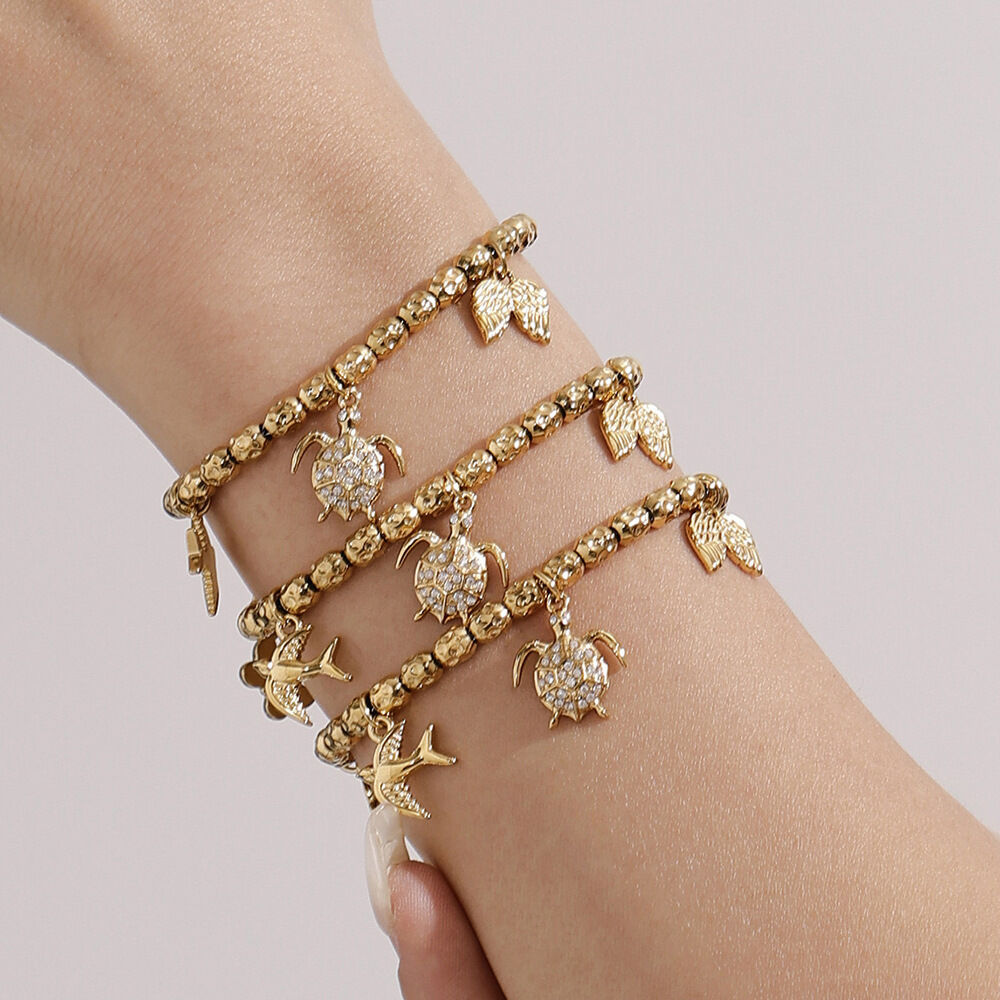 Luxuriöses Schmuckset für Damen aus wasserfestem Edelstahl in Goldfarbe mit Zirkonia-Motiv in Tierform h5Bild4