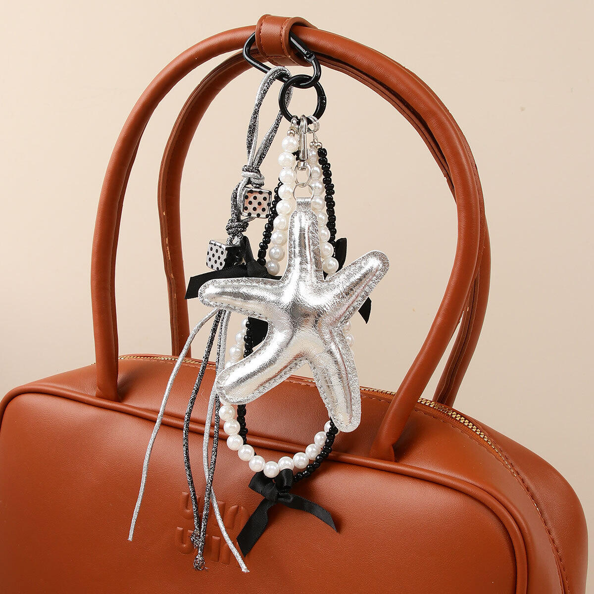 1 Stück einfache leichte Luxus-Stern-Taschenanhänger für Damen Bild3